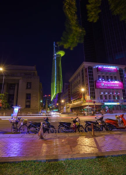 Ho Chi Minh city colorful night with laser lighting on at the Bitexco Financial Tower National celebration 2015 — Stock Photo, Image