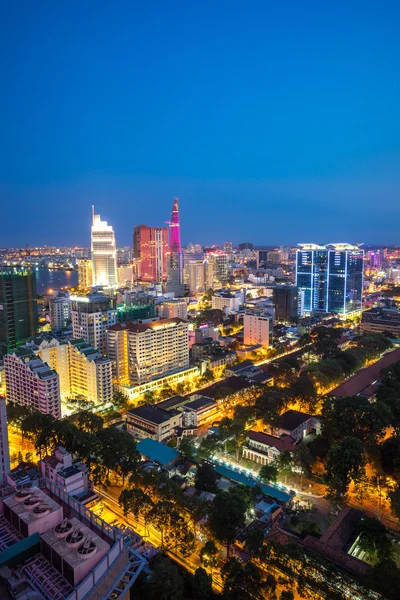 Ho Chi Minh city aeriel view 2015 with new buildings and five star hotels at colorful lights night downtown riverside — Stock Photo, Image