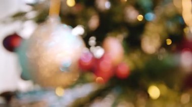 Blurred background with Christmas tree and decorations, New Years Eve theme. High quality 4k footage