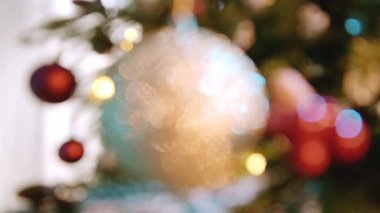 Blurred background with Christmas tree and decorations, New Years Eve theme. High quality 4k footage