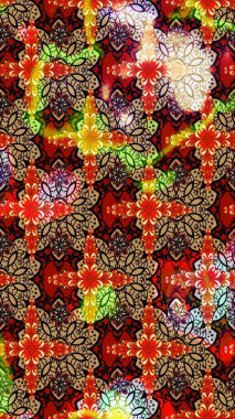 Çiçeksel çizim kalıbının yansıması. Vadinin çiçekleri kırmızı renklerde.