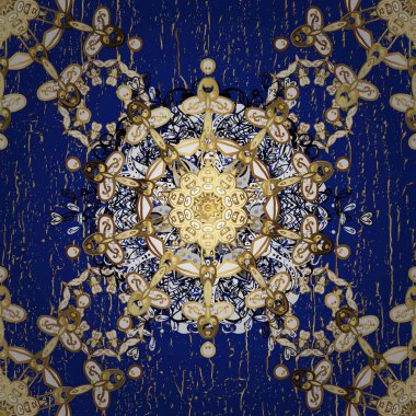 Oyma. Altın elementlerle beyaz ve mavi renklerde desen. Lüks. Kusursuz ahşap oyma. Klasik mobilya tarzı. Patina. Altın kaplamalı beyaz ve mavi arka plan. Küçük alan derinliği.