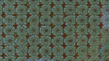 Renkli unsurlarla hareketli arka plan görüntüleri. Çiçekler. Eski model. Bayrak tarzı. Video kaydı. Şablon. Döngü. Kusursuz..