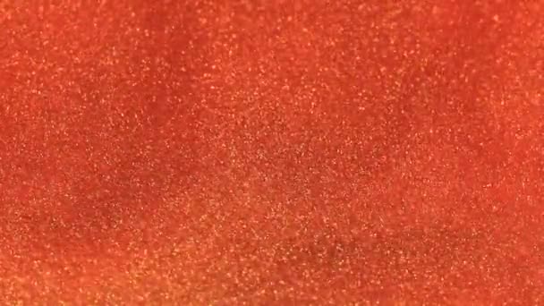 Paillettes dans les images d'eau rouge .