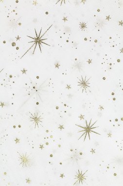 beyaz zemin üzerine altın yıldız