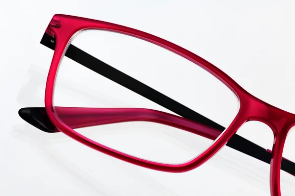 Red eyeglass frame close up — Stock Photo, Image