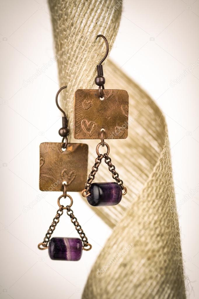 Copper earrings with purple stones