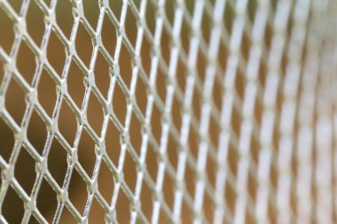 Metal ızgara arka plan ile sınırlı odak düzlemi