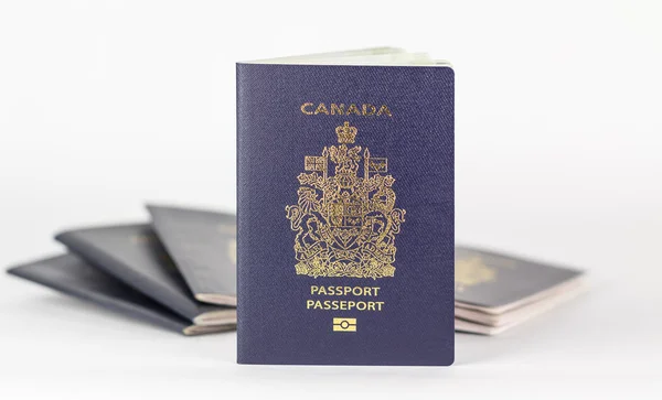New Canadian ePassport with old in background — Stock Photo, Image