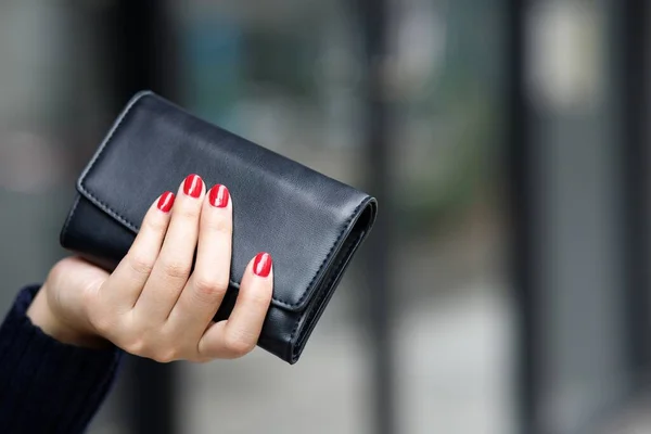 A woman with a wallet Ready for online shopping