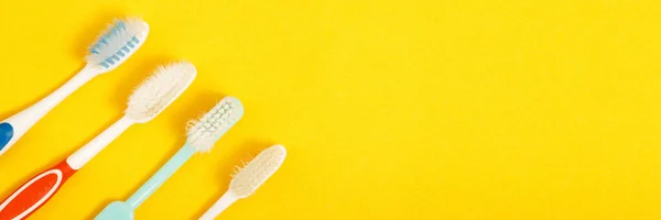Old Toothbrush Yellow Background — Stock Photo, Image