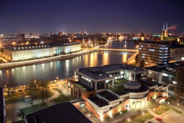 WROCLAW, POLAND - MARCH 21, 2016: Aerial view of Wroclaw. Illuminated city skyline at night, March 21, 2016 in Wroclaw, Poland.