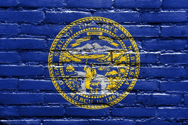 Drapeau de l'État du Nebraska, peint sur un mur de briques — Photo