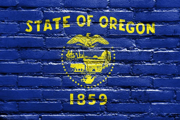 Flagga Oregon State, målade på tegelvägg — Stockfoto