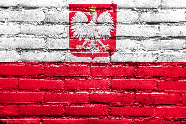 Polská vlajka s erbem, maloval na zdi — Stock fotografie