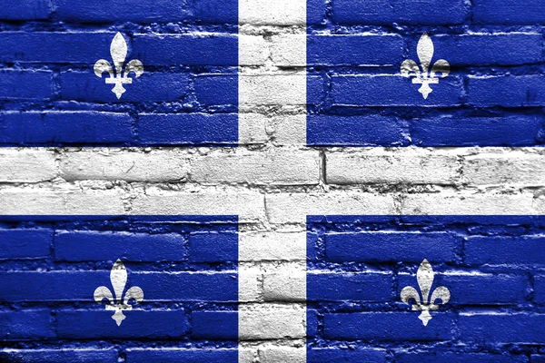 Vlag van Québec, geschilderd op bakstenen muur — Stockfoto