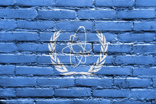 Flag of the International Atomic Energy Agency (IAEA), painted o — Stock Photo, Image