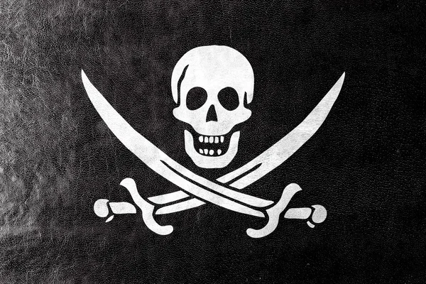 Calico Jack pirat flagga, målade på läder texture — Stockfoto