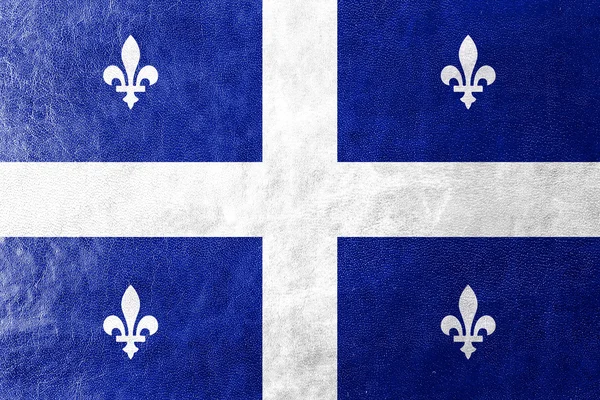 Quebec, deri dokusu üzerinde boyalı bayrağı