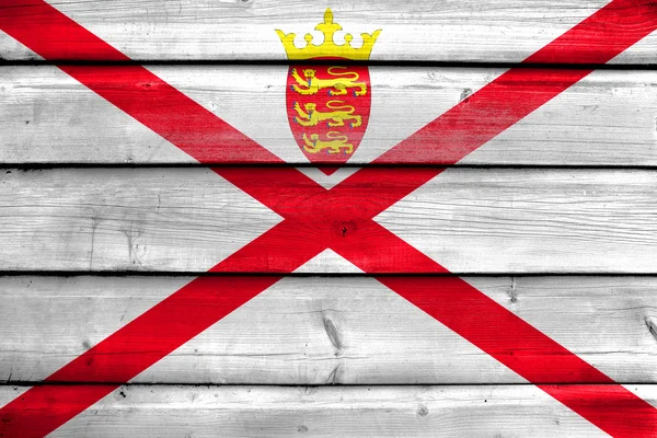 Vlajka Jersey, namalované na staré dřevěné prkenné pozadí — Stock fotografie