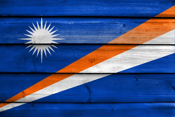 Flag of Marshall Islands, painted on old wood plank background — Stock Photo, Image