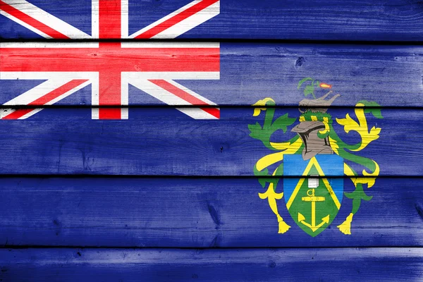 皮特凯恩群岛，旧木板背景上画着的旗帜 — 图库照片