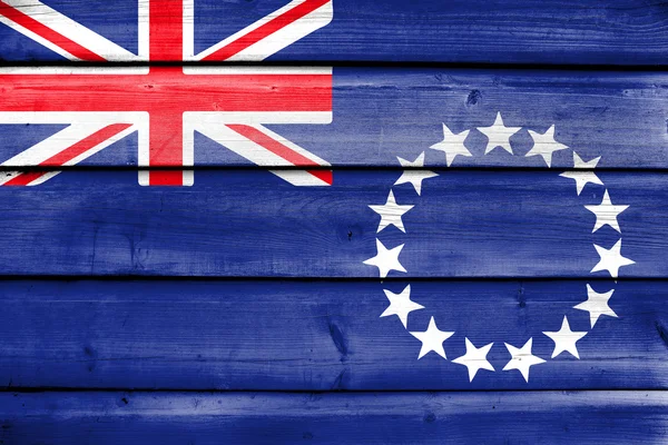 Bandeira das Ilhas Cook, pintada sobre fundo velho prancha de madeira — Fotografia de Stock