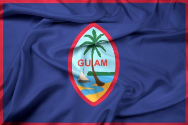 Guam bayrağı sallayarak