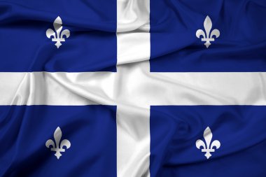 Quebec bayrağı sallayarak