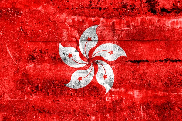 汚れた壁に描かれた香港の旗。ヴィンテージと古い外観. — ストック写真