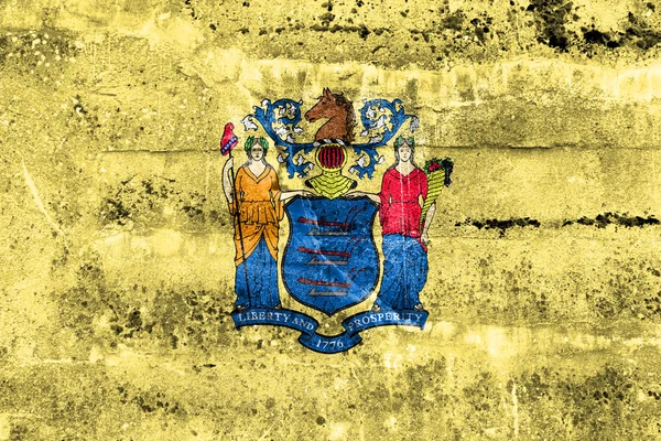 Vlajka státu New Jersey, namalované na špinavé zdi. — Stock fotografie