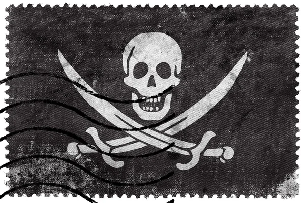 Calico Jack Piratenflagge, alte Briefmarke — Stockfoto