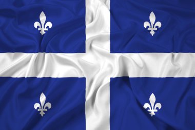 Quebec bayrağı sallayarak