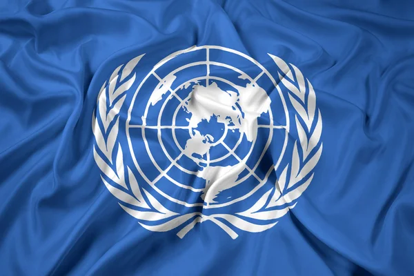 Macha flagą ONZ — Zdjęcie stockowe