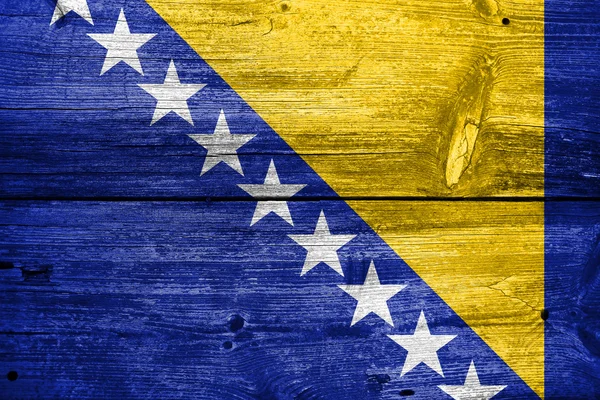 Vlag van Bosnië en Herzegovina, geschilderd op oude houten plank achtergrond — Stockfoto