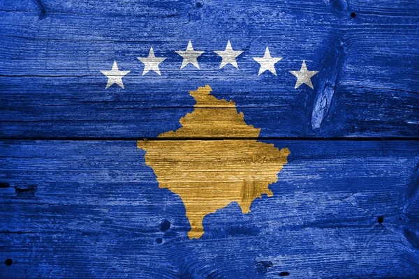 Bandera de Kosovo, pintada sobre fondo de madera vieja — Foto de Stock