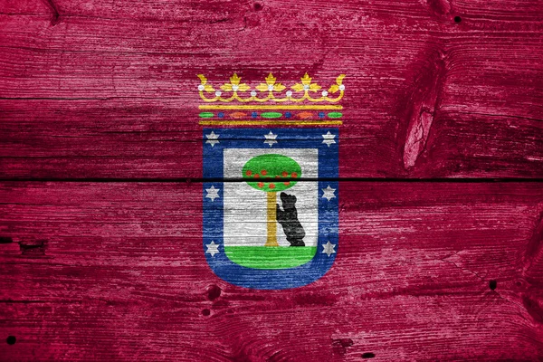 Madrid, a régi fa deszka háttér festett zászlaja — Stock Fotó