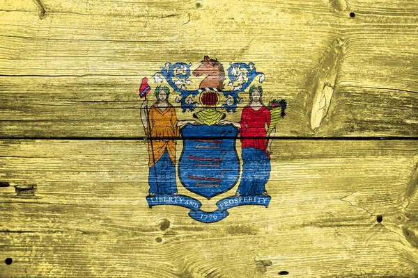 Flaga stanu New Jersey, malowane na tle starego drewna deski — Zdjęcie stockowe