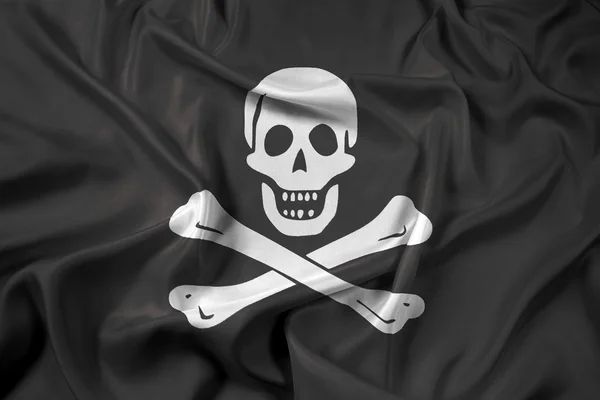 Sventolando la tradizionale Jolly Roger of piracy Bandiera — Foto Stock
