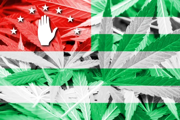 Bandeira da Abcásia, sobre fundo de cannabis — Fotografia de Stock