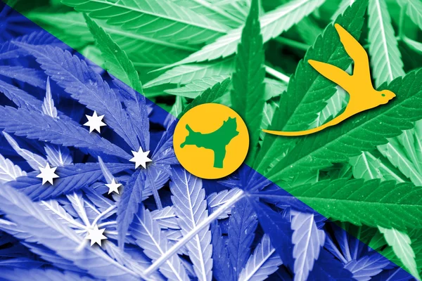 Flagge der Weihnachtsinsel, auf Cannabis-Hintergrund — Stockfoto