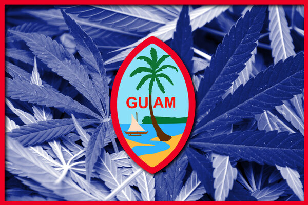 Flag of Guam, on cannabis background
