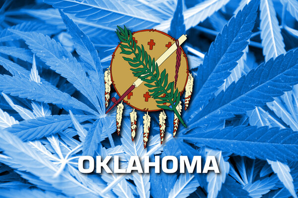 Flag of Oklahoma State, on cannabis background