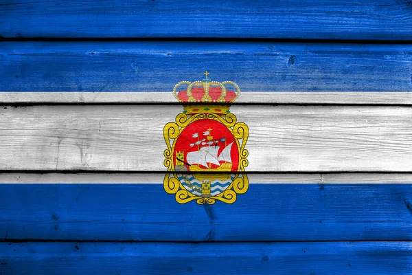 Flag of Aviles, Spain, painted on old wood plank background — Stock Photo, Image