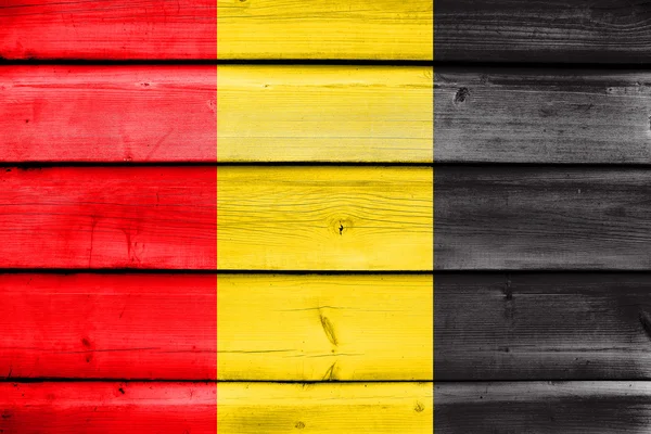 Drapeau de Besancon, France, peint sur un vieux fond de planche de bois — Photo