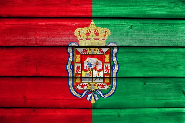 Bandiera di Granada, Spagna, dipinta su vecchio fondo di tavola di legno — Foto Stock