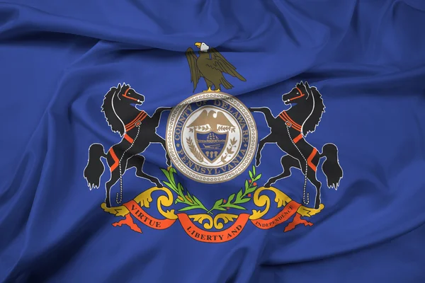 Zwaaien de vlag van de Amerikaanse staat Pennsylvania, en valt bestuurlijk gezien onder Delaware County — Stockfoto