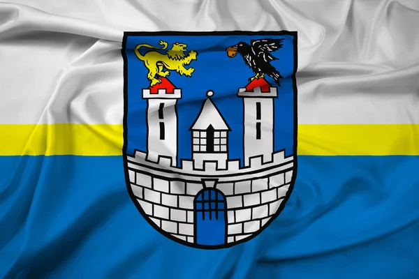 Viftande flagga Czestochowa med vapensköld, Polen — Stockfoto