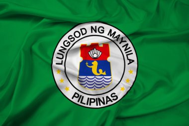 Manila, Filipinler bayrağı sallayarak