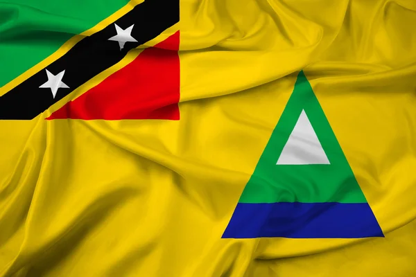 Macha flagą z Nevis, Saint Kitts i Nevis — Zdjęcie stockowe